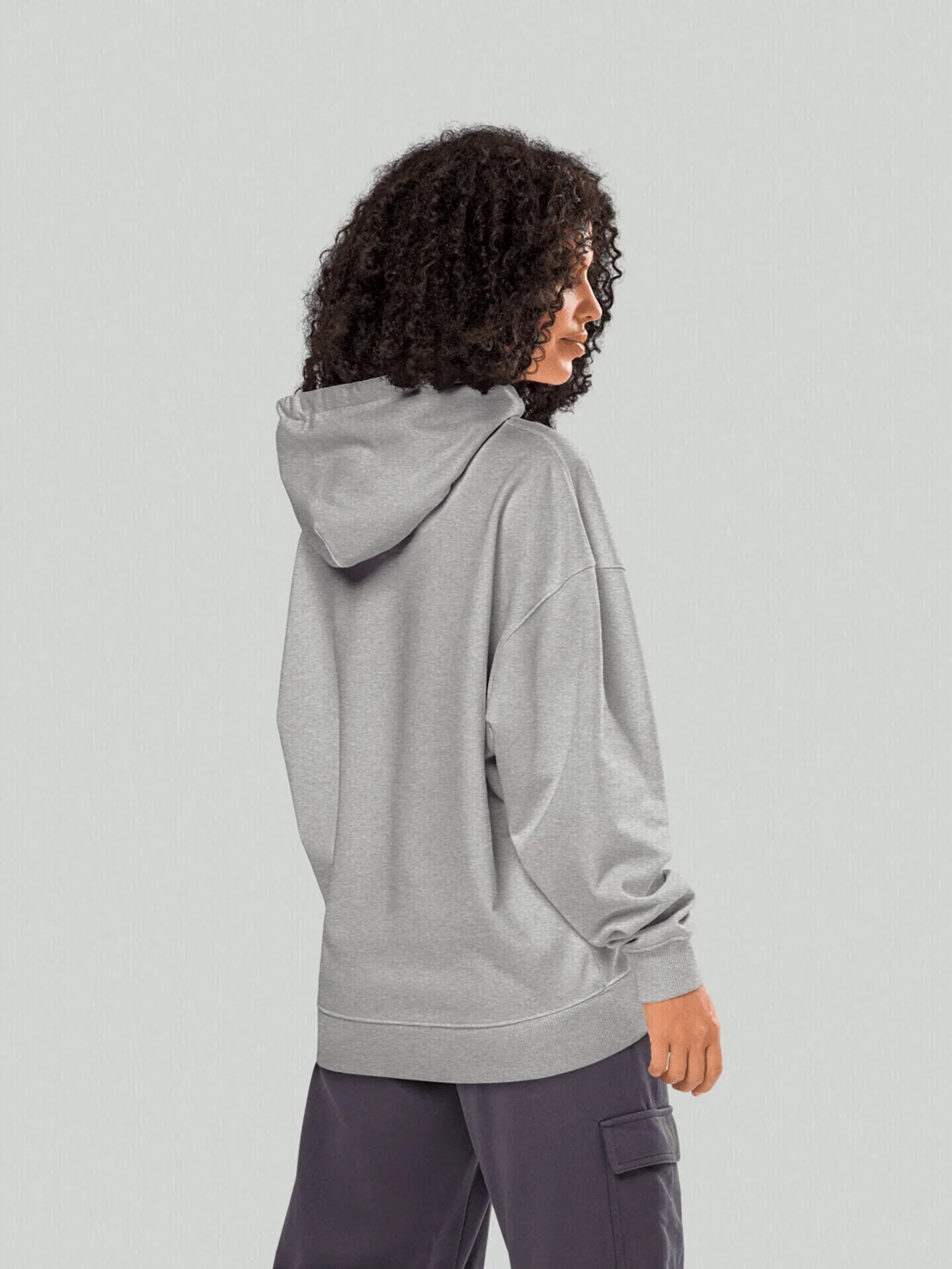 VIICCE Core Heavyweight Hoodie in Concrete Grey. Back and side view of oversized women's hoodie with structured hood and dropped shoulders. Minimalist streetwear style.