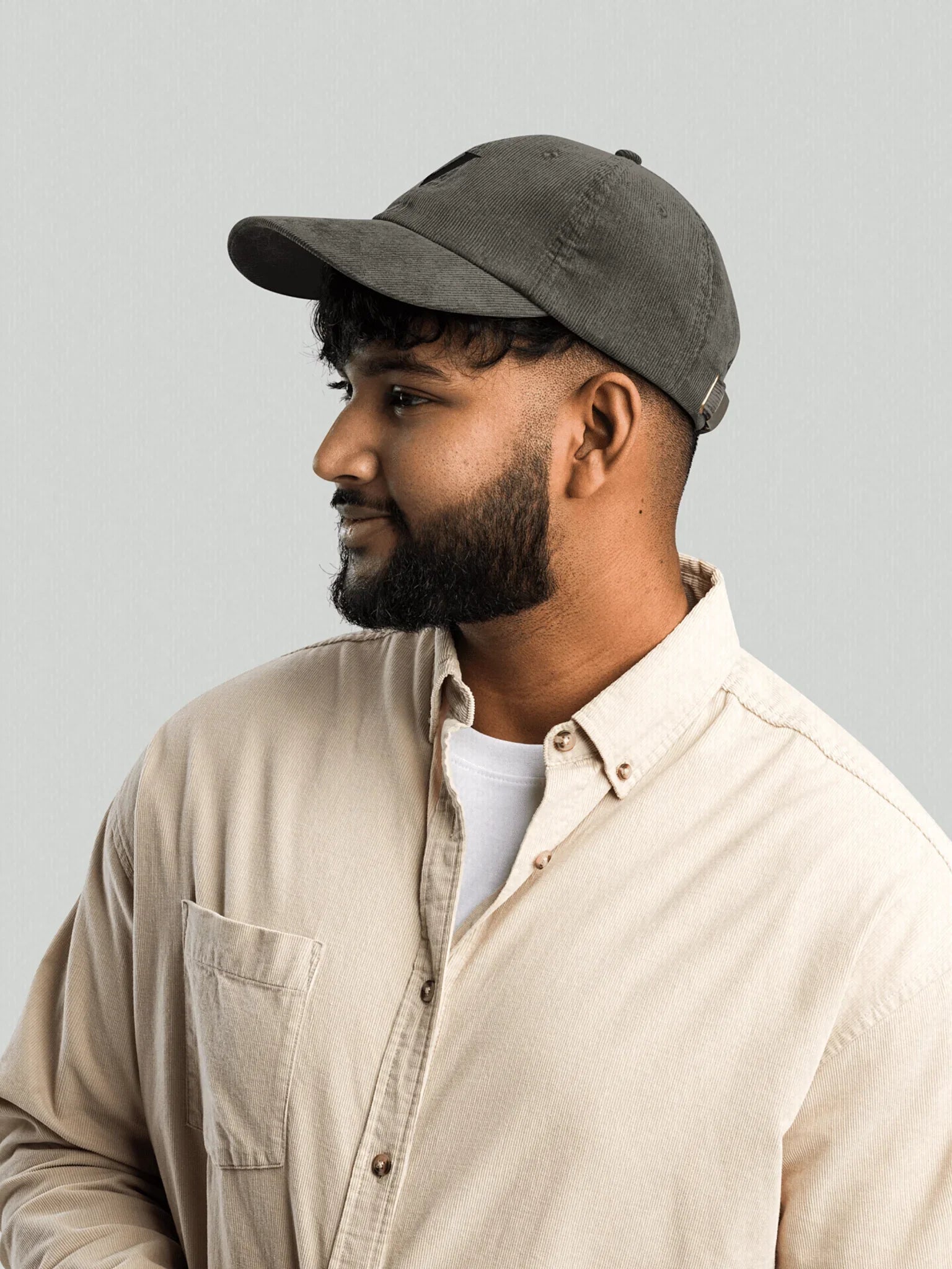 Model with side view, olive corduroy cap, VIICCE vintage finish