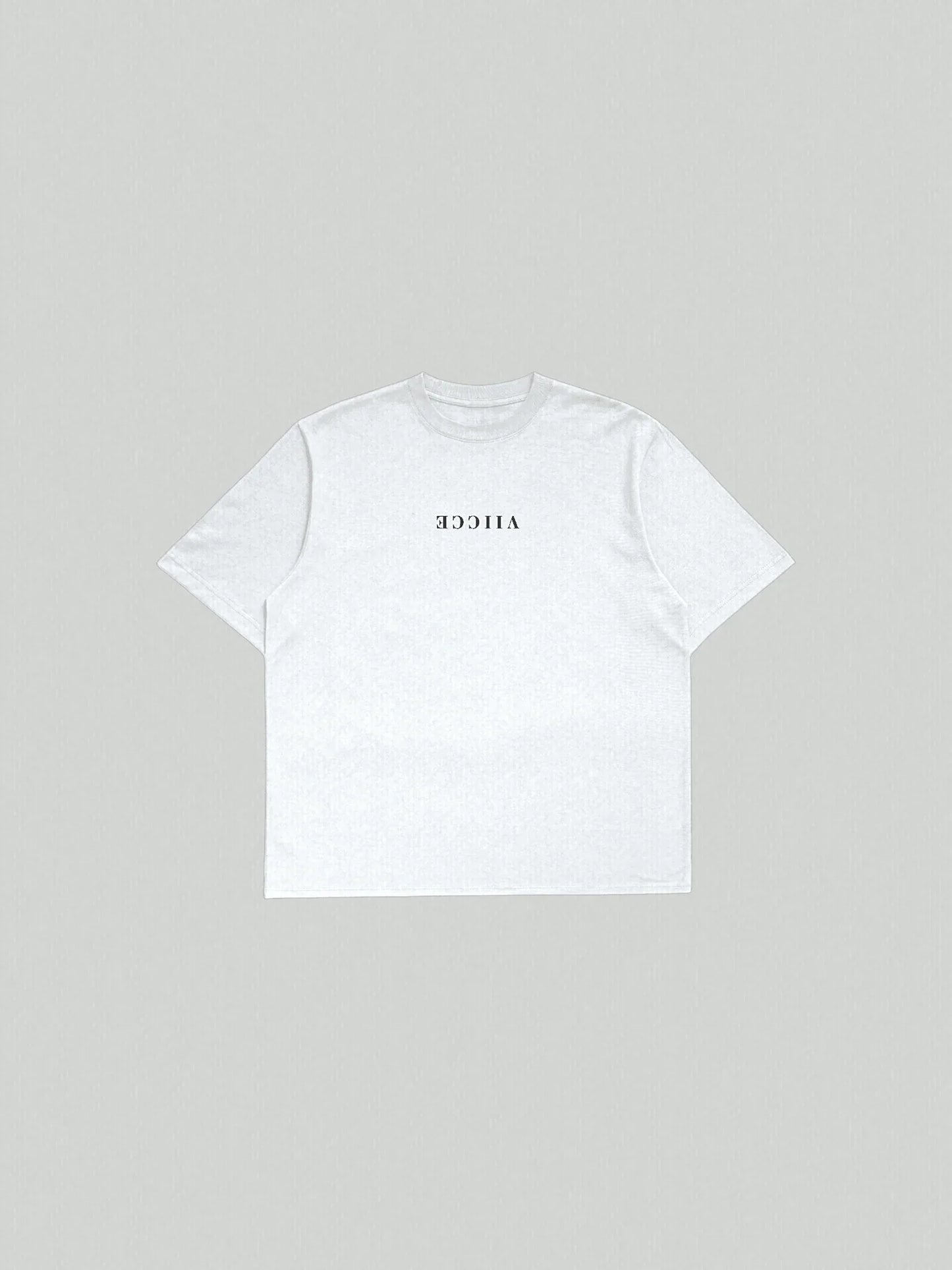 Origin Tee - Ash White Oversized.  Oversized ash-white T-shirt with viicce written upside down on the chest. Made from high-quality organic cotton. Studio photo.