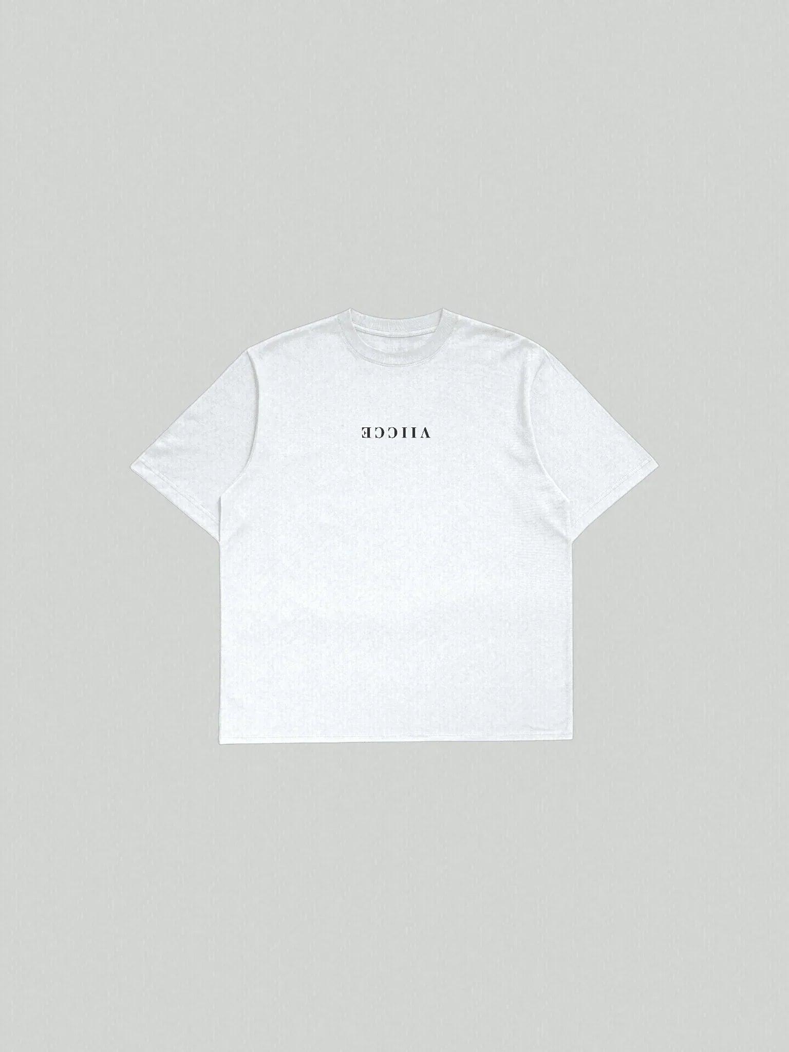 Origin Tee - Ash White Oversized.  Oversized ash-white T-shirt with viicce written upside down on the chest. Made from high-quality organic cotton. Studio photo.