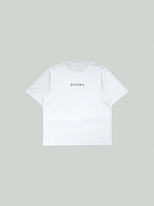 Origin Tee - Ash White Oversized.  Oversized ash-white T-shirt with viicce written upside down on the chest. Made from high-quality organic cotton. Studio photo.