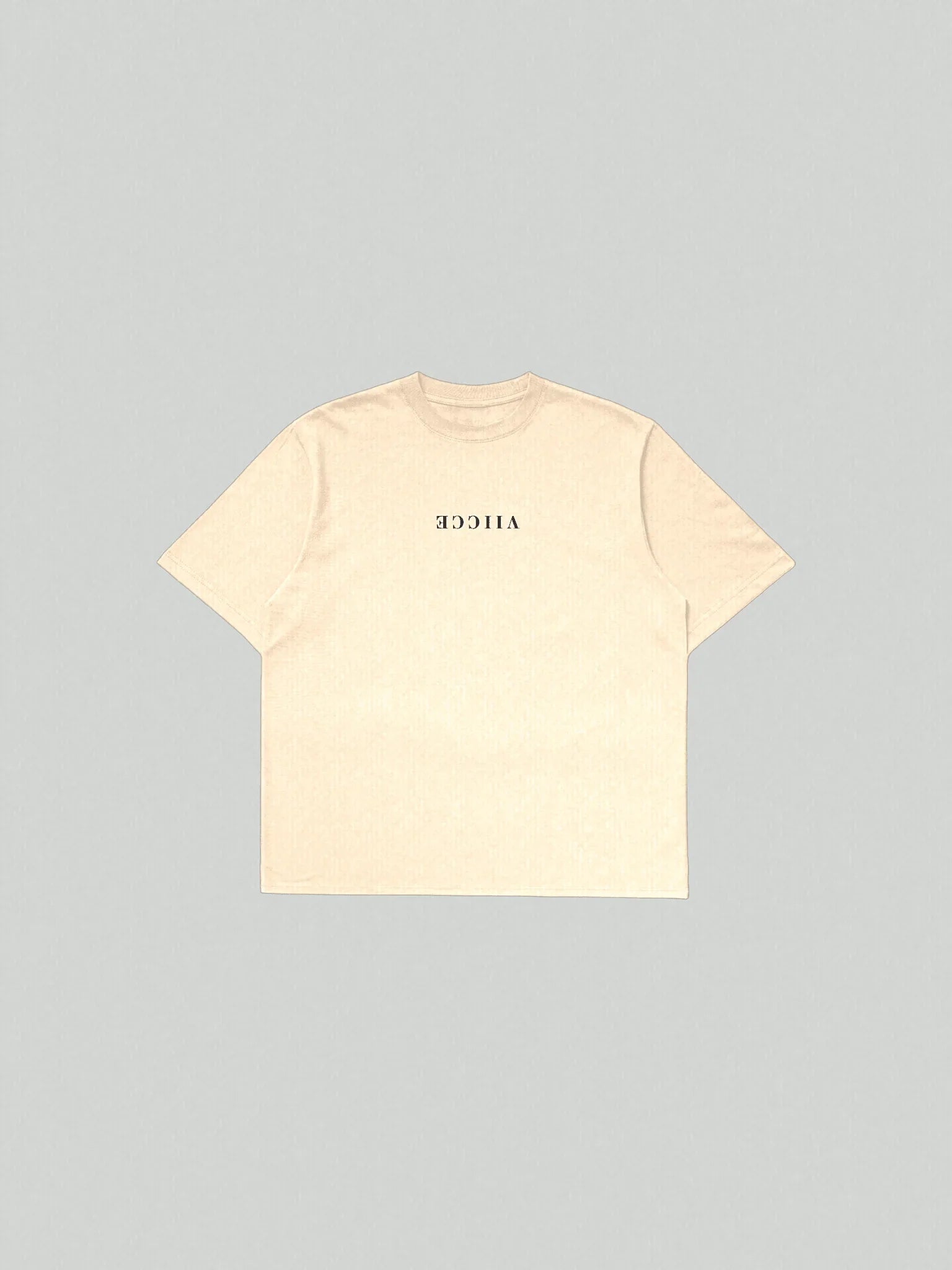 Starlight Tee - Vintage White. Flat lay, t-shirt facing up on the floor with the label facing down. Made with high-quality organic cotton. Studio photo.