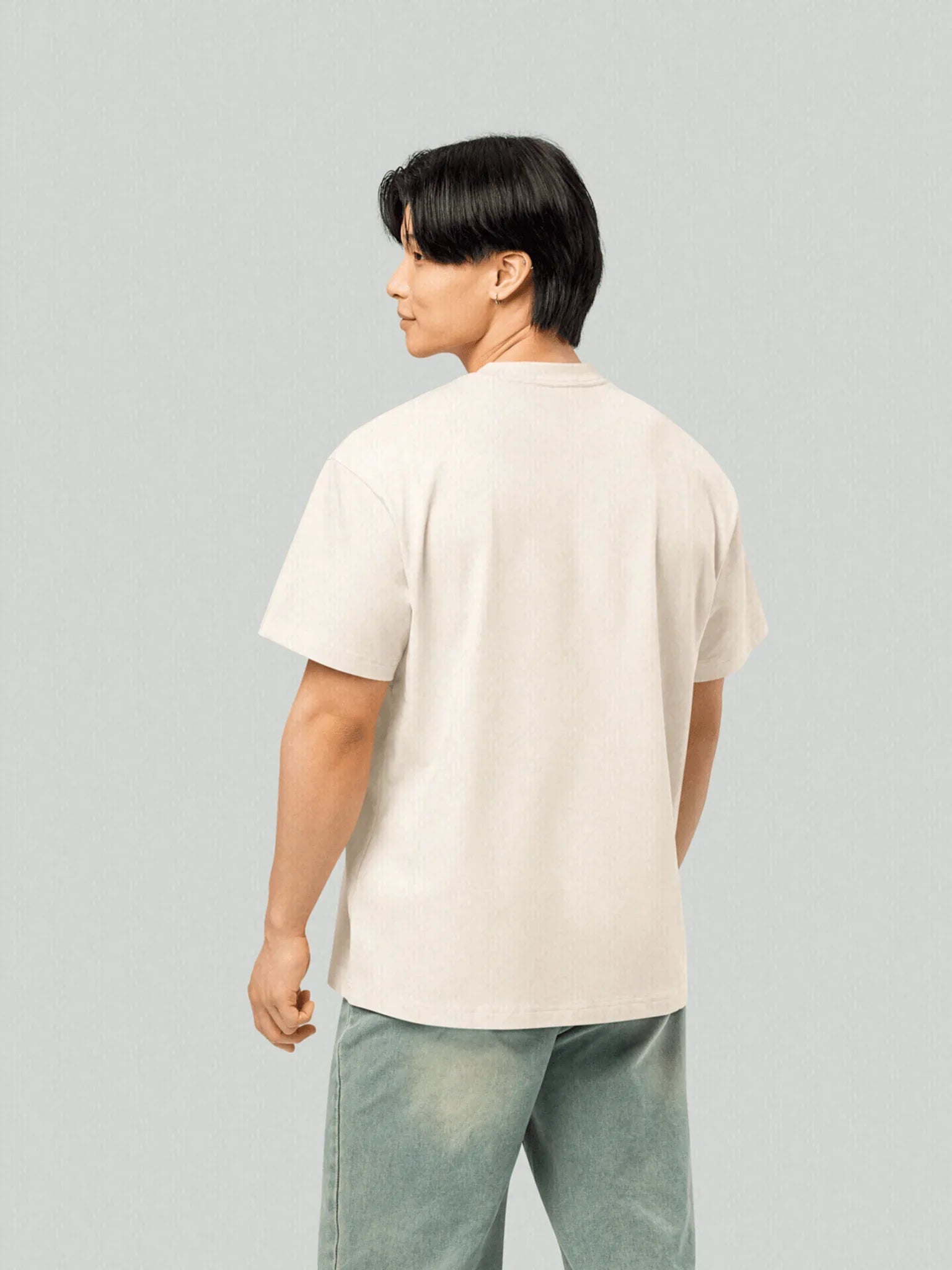 Starlight Tee - Vintage White. Back model. Made with the highest quality organic cotton. Studio photo.