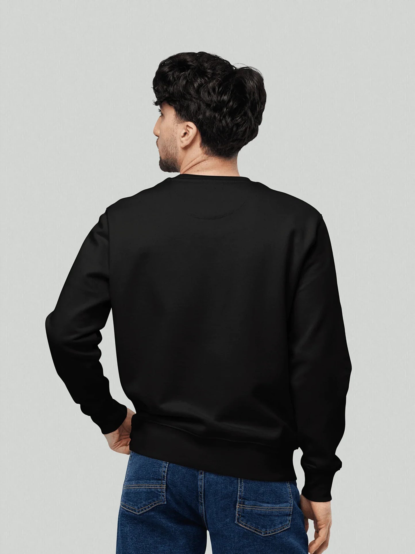 Rear view of the VIICCE Stealth Crewneck. Detail of the structured silhouette and slightly dropped shoulders. Premium smooth cotton fabric with no printing on the back for a minimalist look.