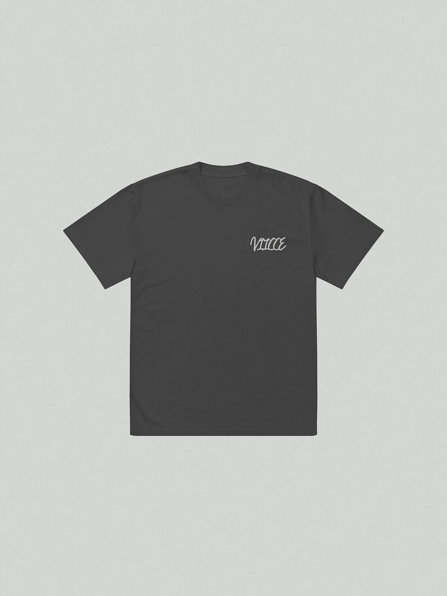 Front view of VIICCE oversized vintage wash T-shirt with minimalist design