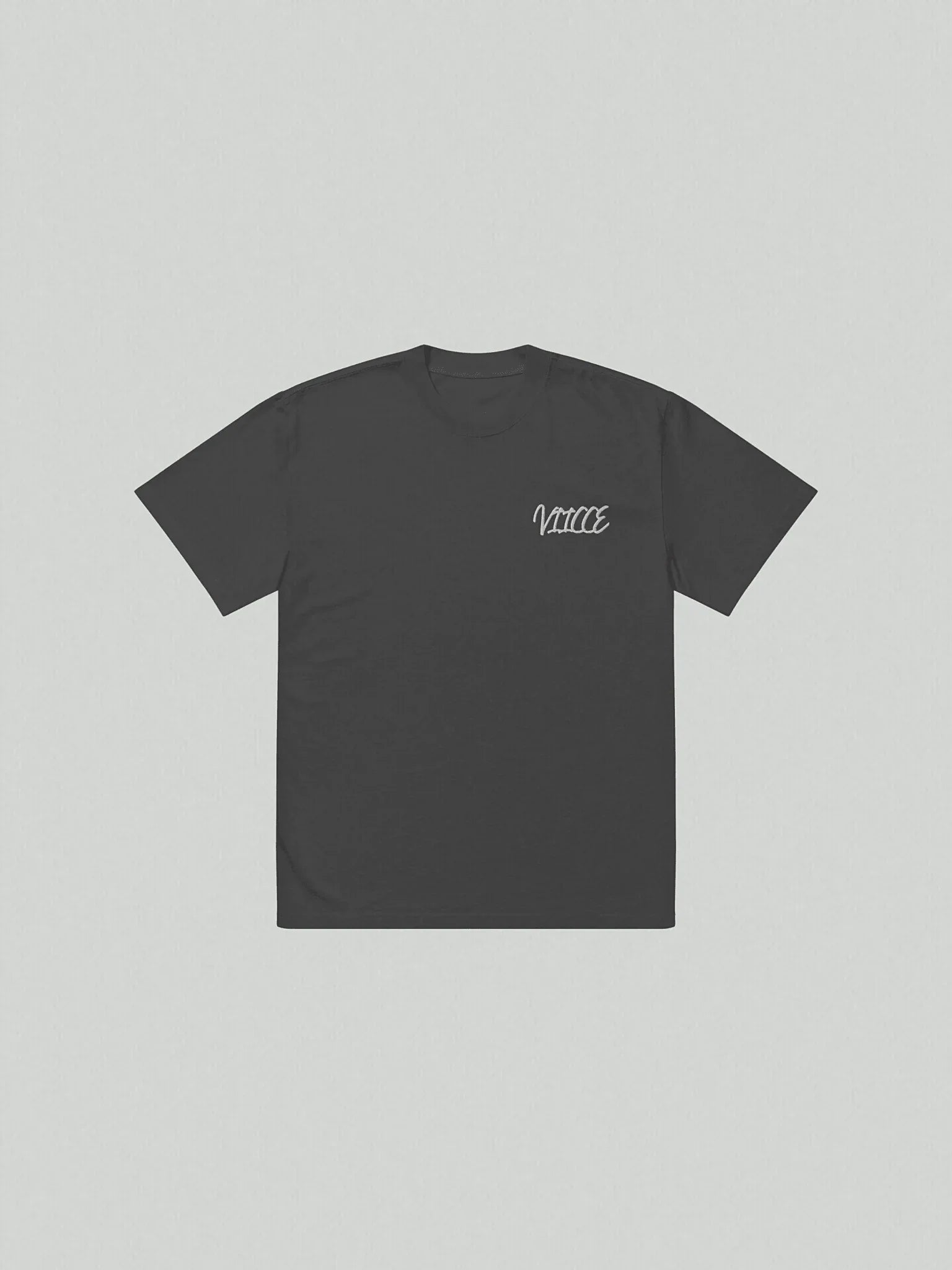 Front view of VIICCE oversized vintage wash T-shirt with minimalist design